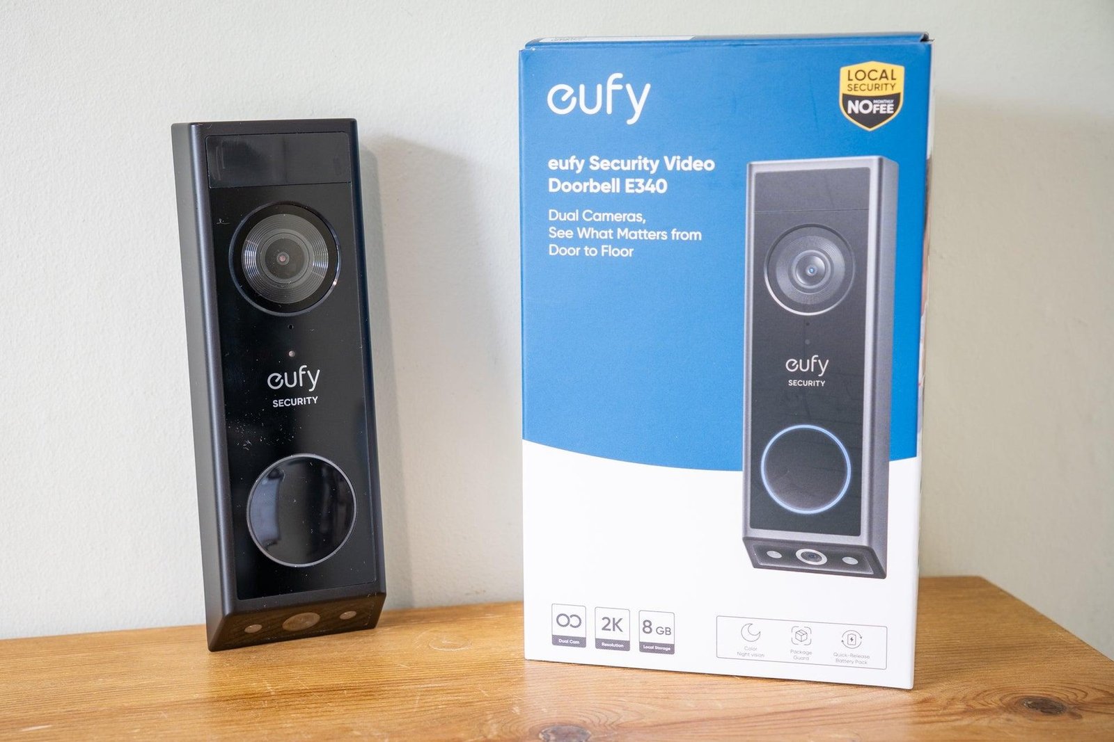 Eufy Video Doorbell E340 beside its retail box